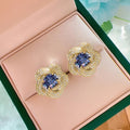 Gold Tone Blue Crystal Flower Stud Earrings Polished Metal Jewelry view 3