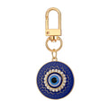 Twelve Piece Gold Tone Owl Heart Butterfly Evil Eye Keychain Set view 3