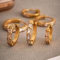 Crystal Crossed and Baguette Hoop Earrings in Gold and Silver Tone view 3
