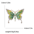 Enamel Butterfly Brooch With Polished Metal And Sculpted Decorative Details view 7