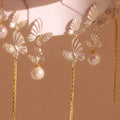 Asymmetric Butterfly Earrings with Pearl and Chain Drops view 2