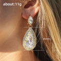 Gold Pear Stone Halo Drop Earrings Metal Jewelry Design view 4