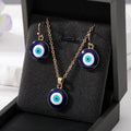 Gold and Silver Tone Navy Evil Eye Earrings and Necklaces view 5
