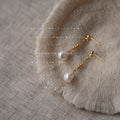 Gold Tone Fine Chain And White Pearl Like Drop Stud Earrings view 1