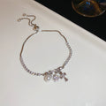 Snowflake Cross And Pearl Like Crystal Bracelets In Gold Or Silver view 6