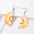 Silver Tone Daisy Acrylic Hook Earrings in Yellow and Blue view 1