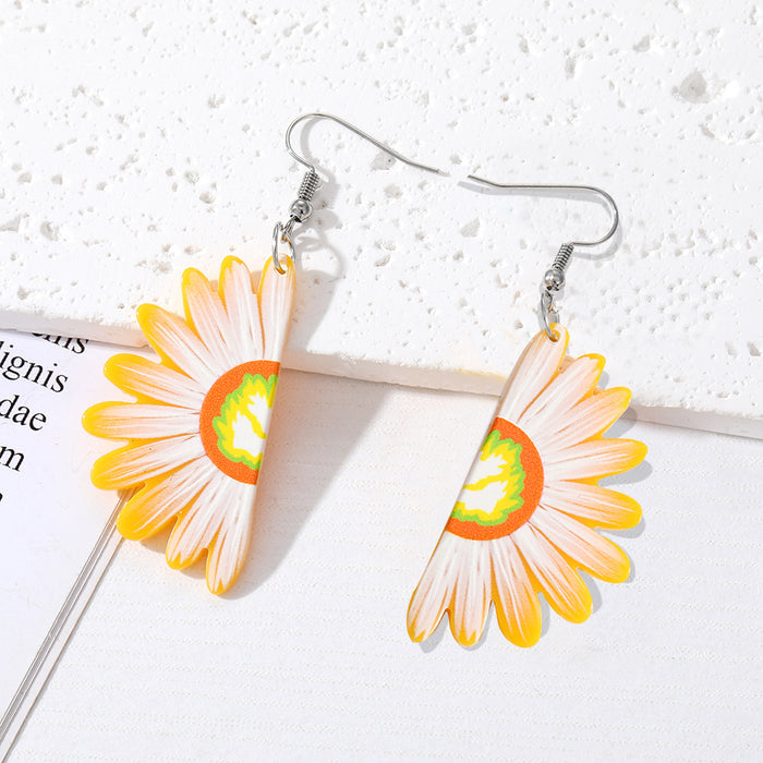 Silver Tone Daisy Acrylic Hook Earrings in Yellow and Blue
