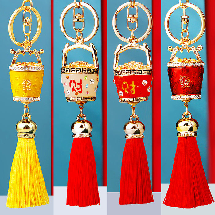 Classic and Revised Fortune Bucket Tassel Keychains in Five Color Options