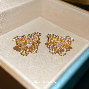 Gold Tone Openwork Butterfly Stud Earrings with Clear Crystals