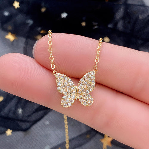 Butterfly Pendant Necklace With Gold Tone Chain, alternate angle.