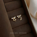 Gold Tone Crescent Moon And Star Asymmetric Drop Stud Earrings view 1