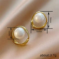 Gold Tone Open Geometric Frame White Pearl Stud Earrings view 4