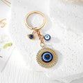 Blue Evil Eye Owl, Elephant and Round Metal Keychains view 4