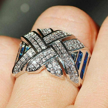 Silver Cross Weave Ring Clear Pave Blue Baguette Stones