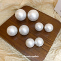 White Round Pearl Look Stud Earrings in Three Sizes view 3