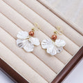 Four White Petal Flower Bead Hook and Clip Earrings view 8