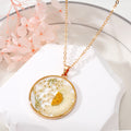 Gold Tone Round Resin Pressed Daisy Pendant Necklaces in Six Colors view 2