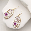 Gold Face Outline Purple Pressed Flower Resin Drop Earrings view 1