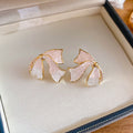 Gold Tone White Crystal Ribbon Bow Statement Stud Earrings view 6