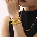 Figure Eight Curve Clasp Bangles Polished Gold and Steel Tone view 3