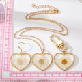 Gold Tone Pressed Daisy Heart Earrings Necklace and Clip Keychain view 5