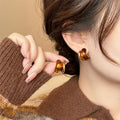 Amber Brown Resin Hoop Earrings With Gold Tone Bars view 2