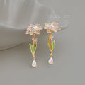 Gold Tone White Flower Green Stem Clear Teardrop Stud Earrings view 4