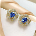 Gold Tone Blue Crystal Flower Stud Earrings Polished Metal Jewelry view 2