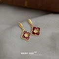 Gold Tone Burgundy Four Petal Flower Long Drop Stud Earrings view 3