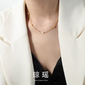 Gold Curb Chain Necklace With Pearl And Barrel Beads view 1