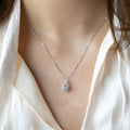 Silver Tone Aqua Emerald Cut Halo Pendant Necklace view 4