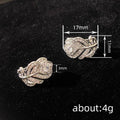 Silver Rose Petal Pave Huggie Earrings Clear Center Stone view 4