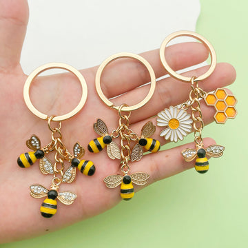Bee and Honeycomb Charm Keychains Featuring Yellow Sunflower Across 47 Pictured Variations