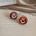 Brown Amber Acrylic Round Smiley Face Stud Earrings Pair view 1