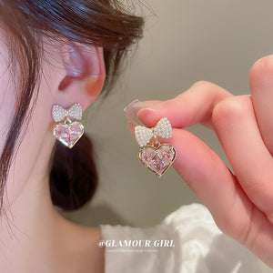 Pink Heart And Crystal Bow Stud Earrings With Polished Metal Tone Details
