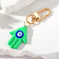 Gold Tone Colorful Hamsa Evil Eye Clip Keychains in Nine Colors view 10