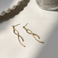 Gold Tone Crystal And Pearl Cross Twist Drop Earrings view 4