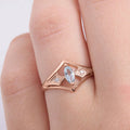 Rose Gold V Band Ring Marquise Light Blue Center Stone view 3