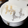 Crystal Star Dangle Clip Earrings in Two Tones with Crystal Accents view 2