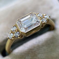 Gold Emerald Cut Clear Stone Bezel Ring Side Accents view 2