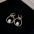 Abstract Hoop Pearl Drop Earrings In Two Metal Tones view 7