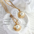 Gold Rope Chain Necklace with Spiral Disc Faux Pearl Pendant view 2