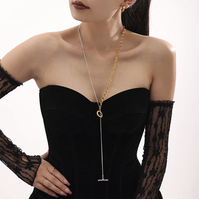 Gold and steel two-tone OT toggle long necklace worn as Y drop