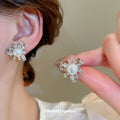 Pearl Center Crystal Petal Stud Earrings in Gold Tone view 4