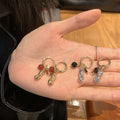 Red Beaded Peanut Charm Hoop Earrings in Gold Tone view 4