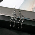Three Silver Tone Skeleton Novelty Dangle Earrings view 3