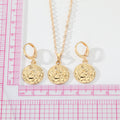 Gold Tone Embossed Cherub Coin Necklace and Huggie Earrings view 4
