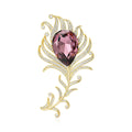 Gold Tone Feather Brooch With Large Purple Teardrop Crystal view 1