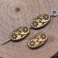 Embossed Double Flower Oval Metal Beads in Three Antique Finishes view 4