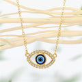 Gold Tone Crystal Halo Blue Evil Eye Chain Pendant Necklace view 1